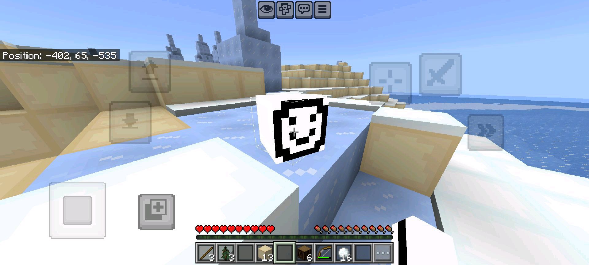Public SMP Server screenshot showing an icy spawn area with custom block art